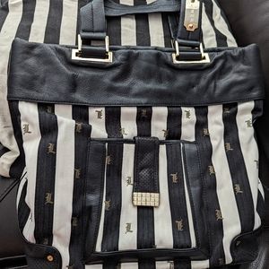L.A.M.B black and white striped canvas and leather handbag